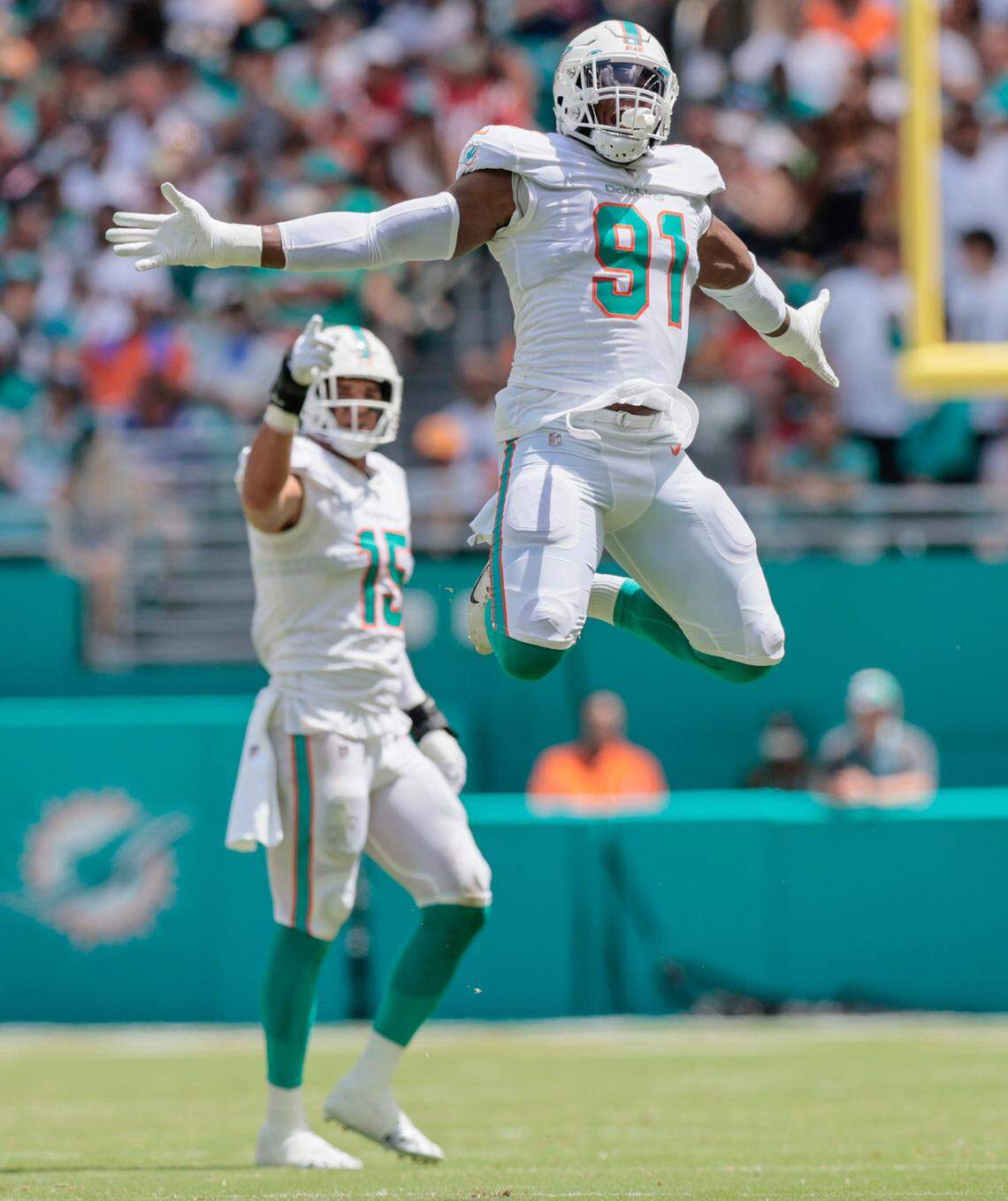Miami Dolphins defensive end Emmanuel Ogbah (91) reacts after sacking New England Patriots quarterback Mac Jones (10) in the first quarter at Hard Rock Stadium in Miami Gardens on Sunday, September 11, 2022.