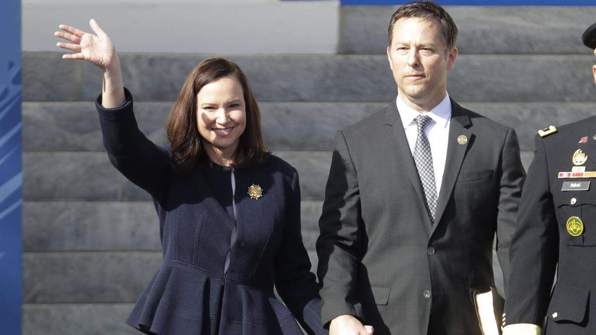 Florida Attorney General-elect Ashley Moody, left, arrives with Justin Duralia for an inauguration ceremony on Tuesday, Jan. 8, 2019, in Tallahassee.
