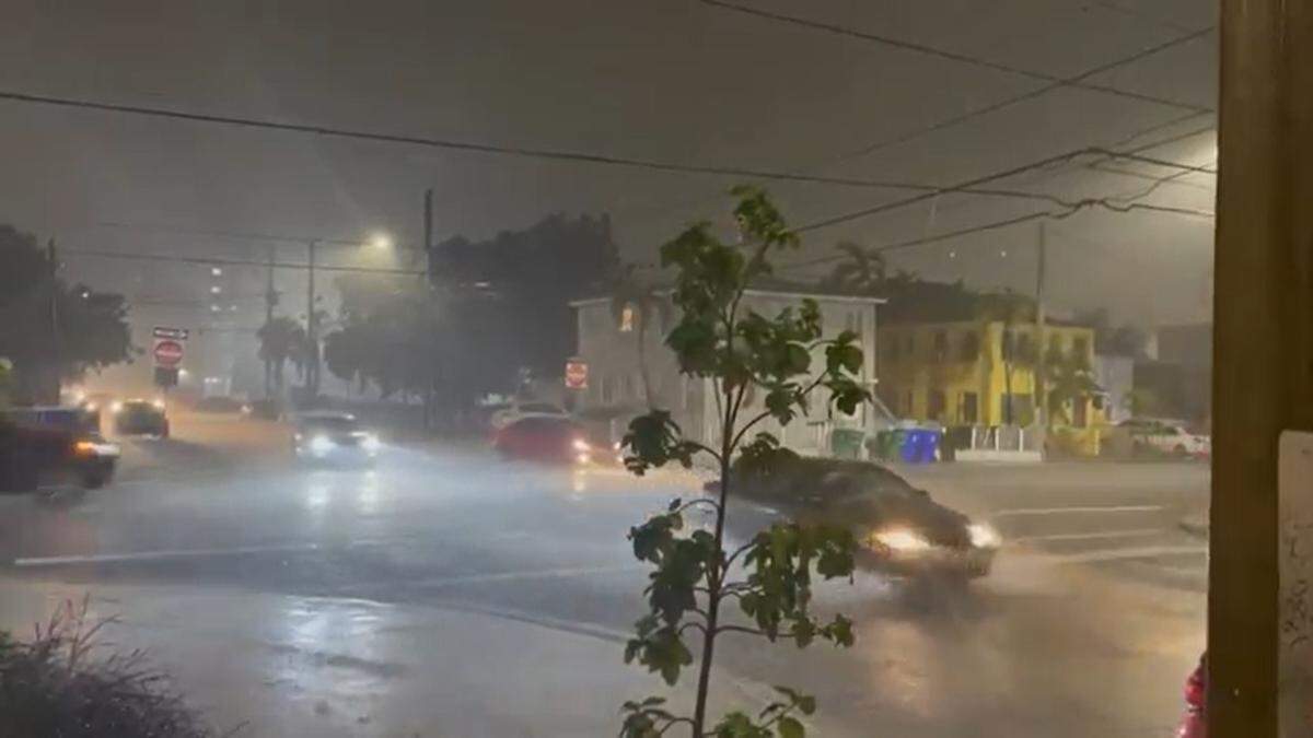 Drivers in a deluge at the corner of Southwest 7th Street and Fifth Avenue near downtown Miami a little before 6:30 p.m, by the east side of Little Havana, on Jan. 11, 2021.