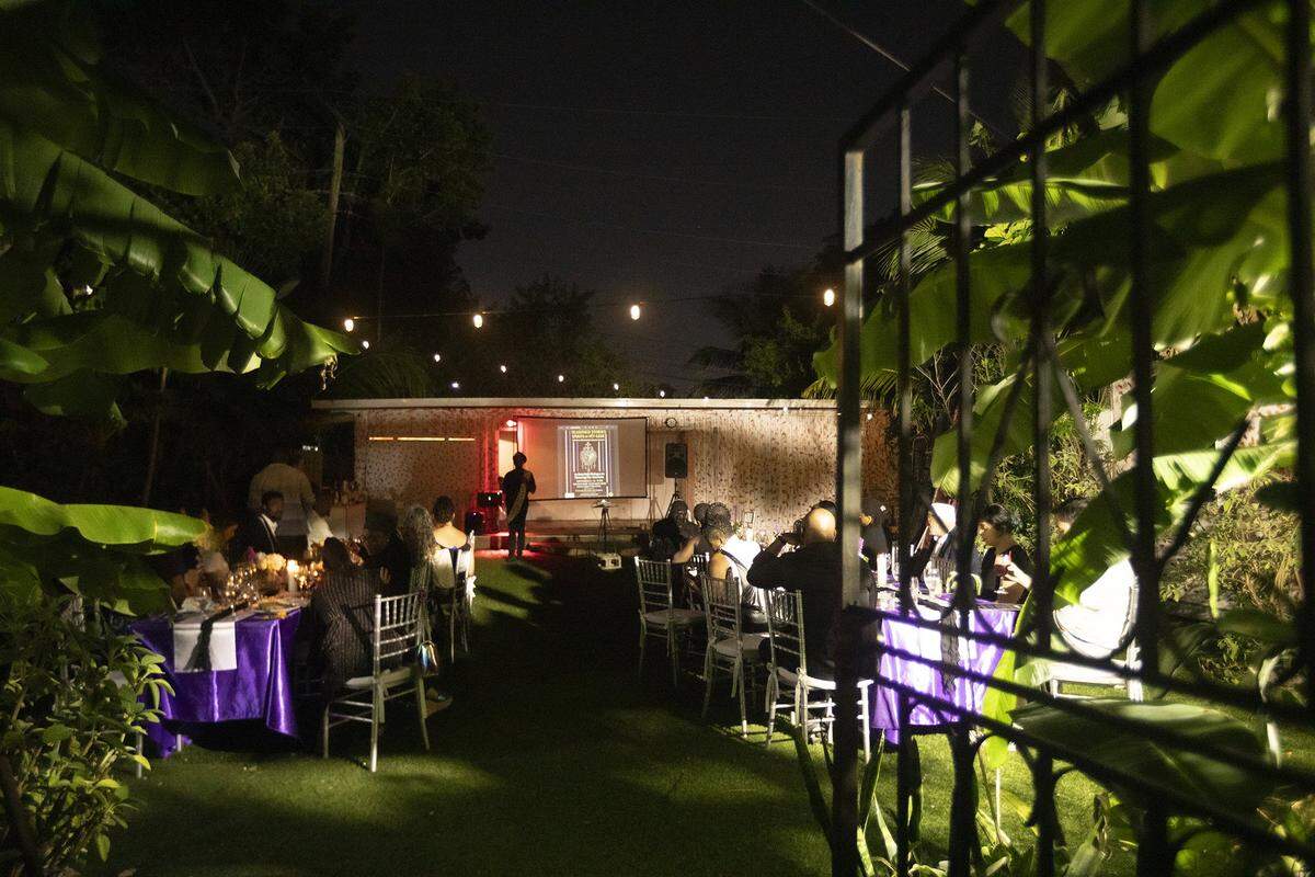 People gather for Fet Gede, the Haitian Day of the Dead celebration, honoring ancestors with love, music, and community at The Vegan Marie in Little Haiti on Nov. 8, 2025.