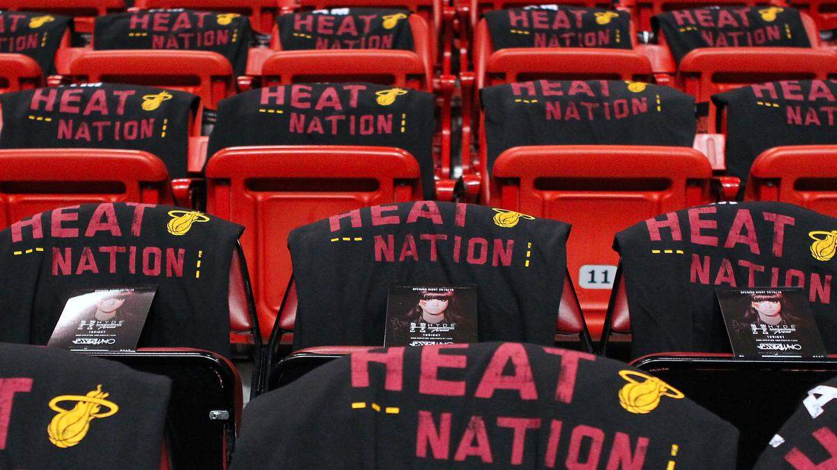 Heat Nation T-shirts for fans are set on every seat before the season opening NBA game against the Washington Wizards at the AmericanAirlines Arena in Miami on Wednesday, October 29, 2014.