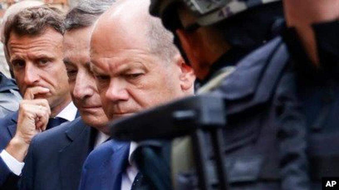 From left, French President Emmanuel Macron, Italian Prime Minister Mario Draghi, and German Chancellor Olaf Scholz visit Irpin, Ukraine, June 16.