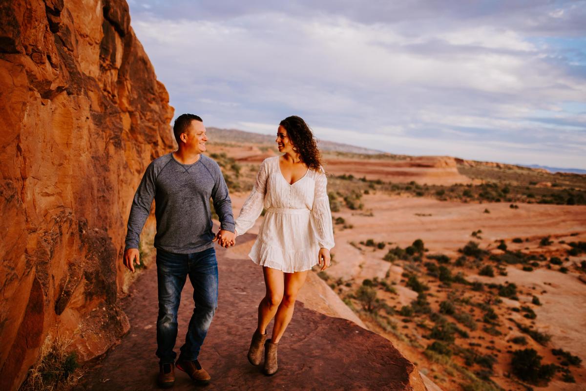 An engagement photo of Miami couple Aurora Dillon and Sam Modzelewski taken in Moab, Utah, in anticipation of their April 4 wedding on the sands of South Miami Beach but which has been postponed because of coronavirus.
