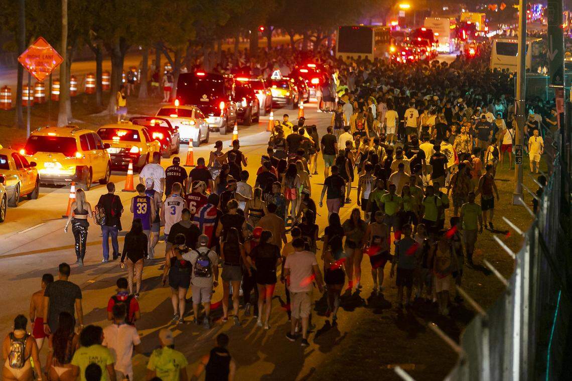 Tens of thousands festival goers make their way out of the 2019 Ultra Music Festival in Virginia Key, Florida on Saturday, March 30, 2019.