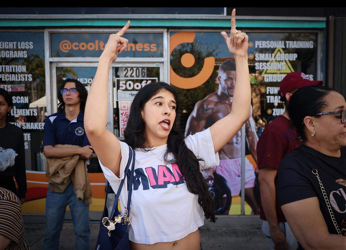 Carolina Florez, 29, dances along with the Miami High marching band as the band paraded in the Miami's 50th Annual Three Kings Parade.