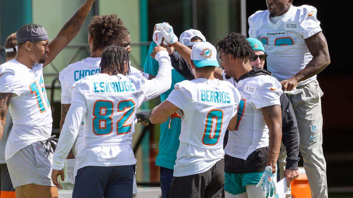 Miami Dolphins wide receiver Tyreek Hill (10) jumps in the huddle during team practice at the Baptist Health Training Complex on Thursday, Sep. 11, 2024, in Miami Gardens, Fla.