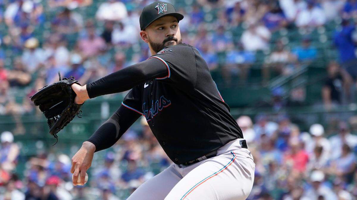 Miami Marlins starting pitcher Pablo Lopez winds up during the first inning of a baseball game against the Chicago Cubs Saturday, Aug. 6, 2022, in Chicago. (AP Photo/Charles Rex Arbogast)