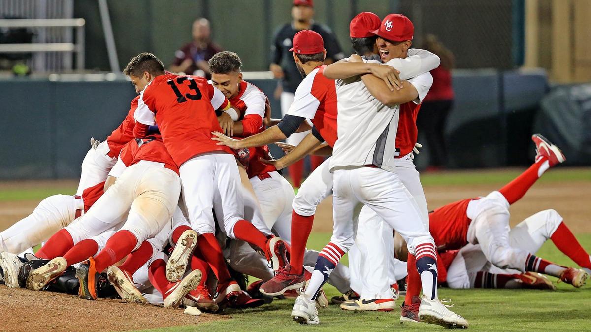 Miami Christian players rush the mound as they defeat Seacrest Country Day School and win the FHSAA Baseball Class 2A State Finals at CenturyLink Sports Complex - Hammond Stadium in Fort Myers, Florida, Thursday, May, 23, 2019.