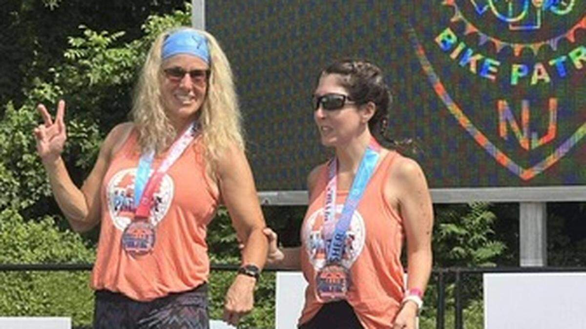 Sandy Duplicki (left) will be guiding blind runner Kimberley Dobbs in the 2026 Life Time Miami Marathon.