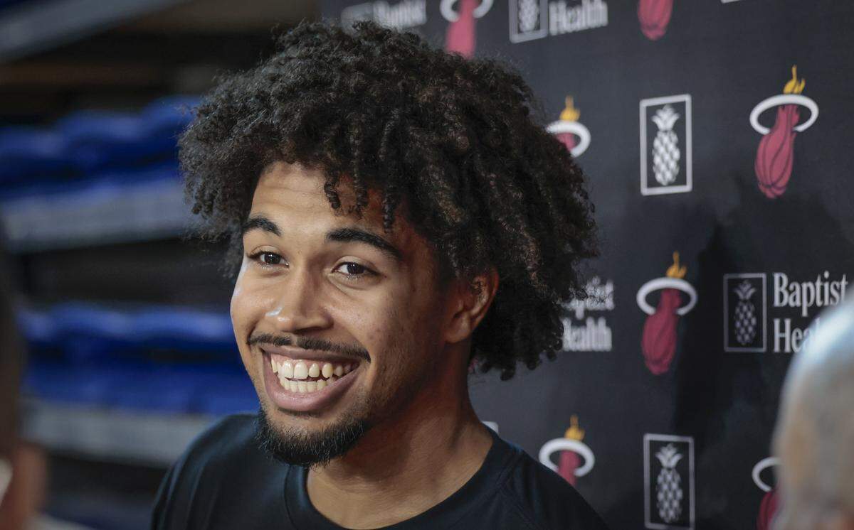 Miami Heat guard Ethan Thompson (55) speaks to reporters after practice at Abessino Court at Eleanor R. Baldwin Arena at Florida Atlantic University in Boca Raton on October 2, 2025.