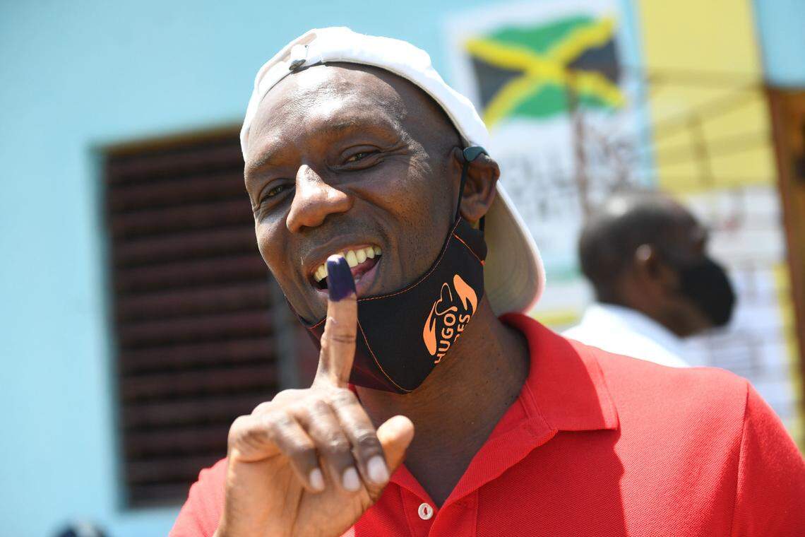 A confident Hugh Graham representing the People’s National Party (PNP) shows his finger with ink at the polling station in Cotton Piece, where he cast his ballot in the St. Catherine north west constituency where hes going up against the Jamaica Labor Party’s Newton Amos on Election day, on September 3,2020.