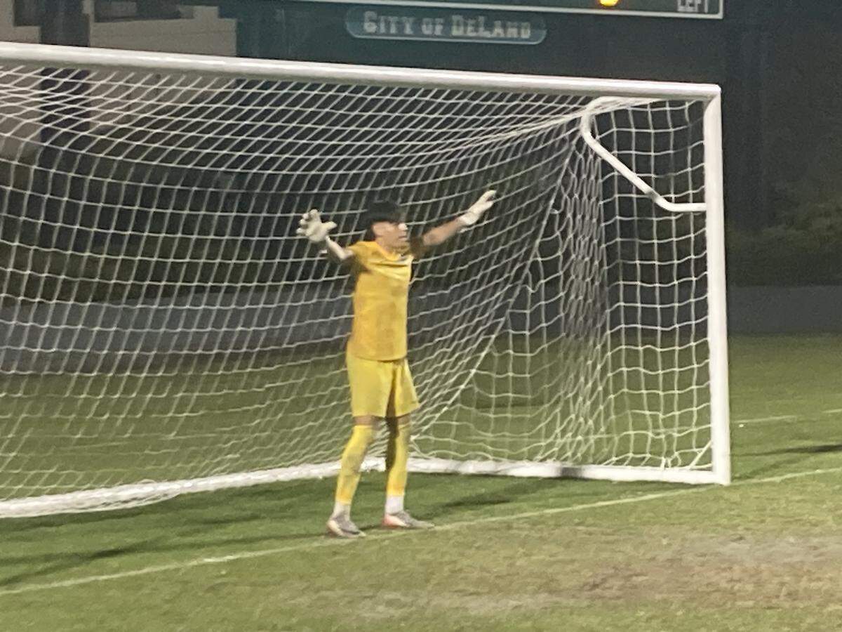 Pembroke Pines Charter goalkeeper Mateo Vasquez prepares to face a penalty kick on Friday night during their Class 5A state semifinal at Spec Martin Stadium in DeLand, Fla.