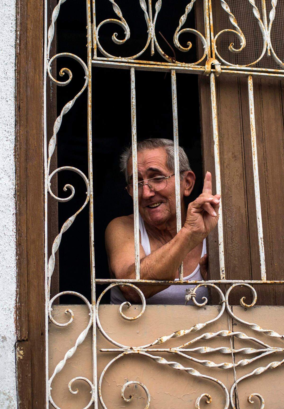 Roberto Suarez Tagle speaks from his home in Santa Clara, Cuba. "He didn't even fix up his house to live more comfortably," said the 78-year-old neighbor of Miguel Diaz-Canel, who is expected to become Cuba's next president. "He always found out about the real problems that people had," said Suarez.