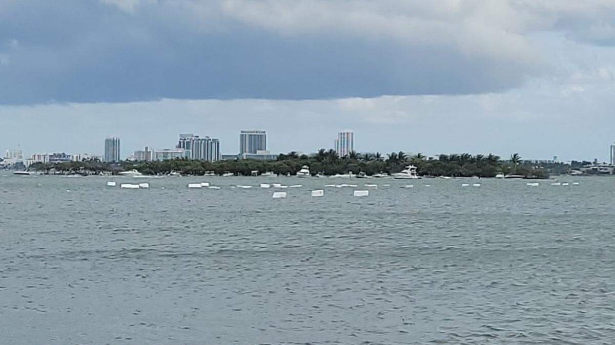 Floating debris from a Miami construction site Saturday afternoon resulted in a $500 fine against the developer of the project. The company blamed high winds for the incident.