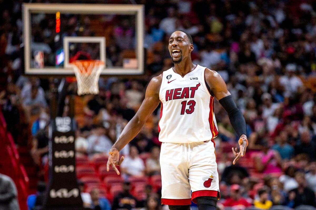 Miami Heat center Bam Adebayo (13) reacts to a shot by teammate Tyler Herro during the third quarter of an NBA preseason game against the New Orleans Pelicans at FTX Arena in Miami on October 12, 2022.
