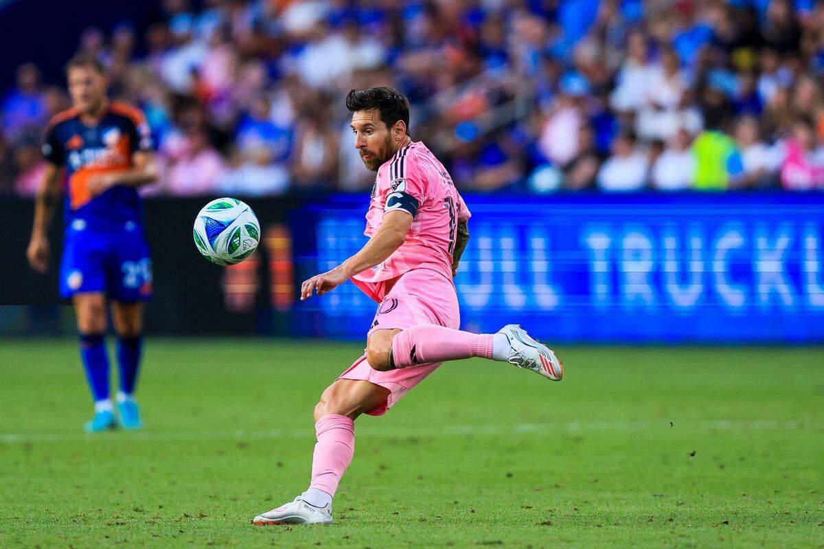Jul 16, 2025; Cincinnati, Ohio, USA; Inter Miami CF forward Lionel Messi (10) kicks the ball against FC Cincinnati in the first half at TQL Stadium. Mandatory Credit: Katie Stratman-Imagn Images