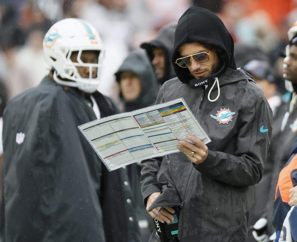 Miami Dolphins head coach Mike McDaniel on the sidelines during the first half of an NFL football game against the Cleveland Browns at Huntington Bank Field in Cleveland, Ohio, on Sunday, October 19, 2025.
