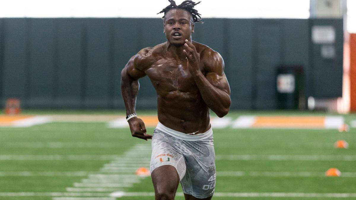 Defensive lineman Mitchell Agude runs drills during Football Pro Day at the University of Miami’s indoor practice facility on Monday, March 27, 2023 in Coral Gables, Fla.