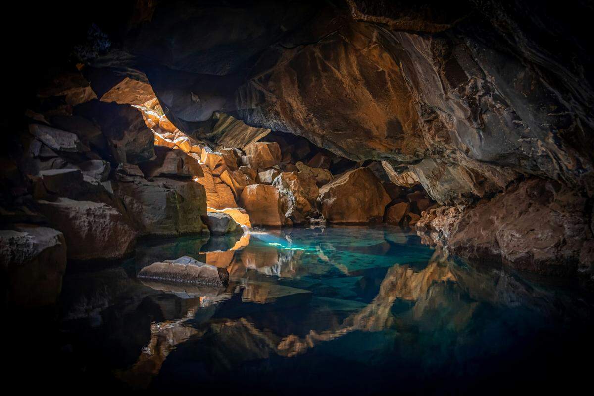 In the clear water of Totem Pole Cave (not pictured), “giant” creatures swim around, waiting to be discovered.