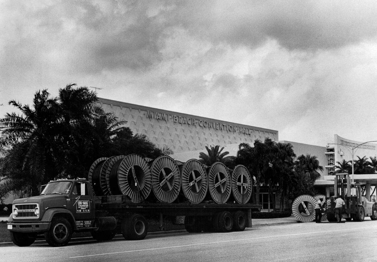 Before The Parties. Truckload of Western Electric exchange cable for the Republican convention arrives at Miami Beach Convention Hall. The Bell System is busy now in the quadrennial task of preparing for the Republican and Democratic National Conventions, to be held in Miami Beach and Chicago this August. Public interest in the presidential nominations is intense, and orders for communications service, particularly from news media, are at an all-time high. Western Electric, Bell’s manufacturing and supply unit, is already on location, providing engineering support and equipment to the Southern Bell and Illinois Bell telephone companies as well as AT&T’s Long Lines Department.