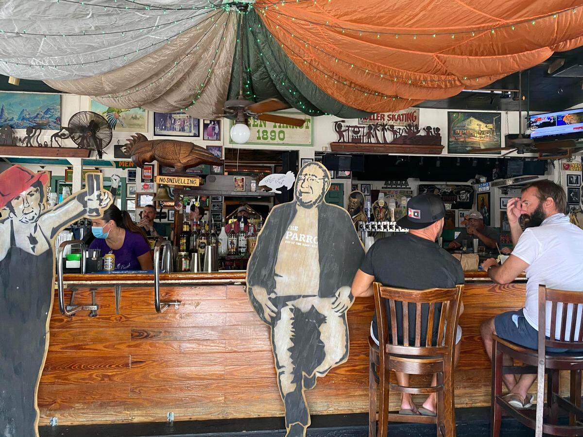 The Green Parrot, which reopened to on-premises drinking Sept. 14, 2020, got creative in marking social distance seating at the bar.