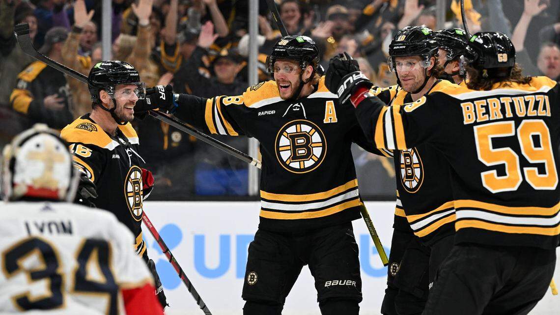 Apr 17, 2023; Boston, Massachusetts, USA; Boston Bruins right wing David Pastrnak (88) celebrates with center David Krejci (46), left wing Tyler Bertuzzi (59), center Pavel Zacha (18), and defenseman Charlie McAvoy (73) after scoring a goal on Florida Panthers goaltender Alex Lyon (34) during the first period of game one of the first round of the 2023 Stanley Cup Playoffs at TD Garden. Mandatory Credit: Brian Fluharty-USA TODAY Sports