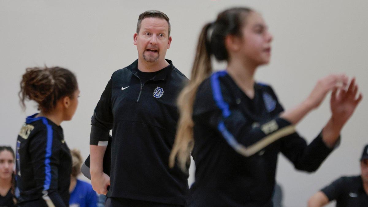 Matt Willems, Athletic Director at Divine Savior Academy directs the team during match between Divine Savior and Chaminade-Madonna in volleyball playoff at Divine Savior Academy on Friday, October 28, 2022.