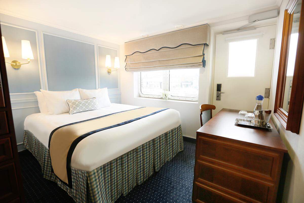 Several cabins on Victory Cruise Lines' Victory I have outdoor access to the deck's balcony.