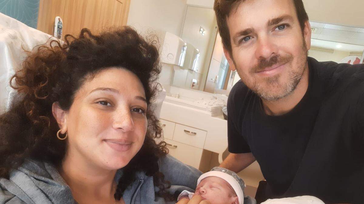 Israeli filmmaker Yahav Winner with his wife Shaylee Atary and their newborn daughter Shayla. Winner was killed by Hamas militants when they attacked Kfar Aza in Israel.