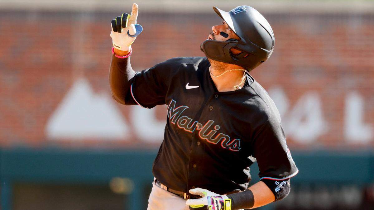 Marlins’ Miguel Rojas rounds the bases after his sixth-inning home run against the Atlanta Braves in a baseball game on Saturday, May 28, 2022, in Atlanta. (AP Photo/Bob Andres)