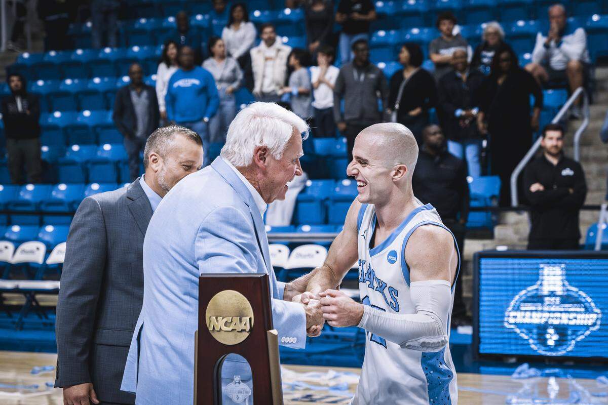 NSU guard Dallas Graziani is congratulated after the Sharks advanced to the NCAA Elite Eight following a win over Alabama-Huntsville.