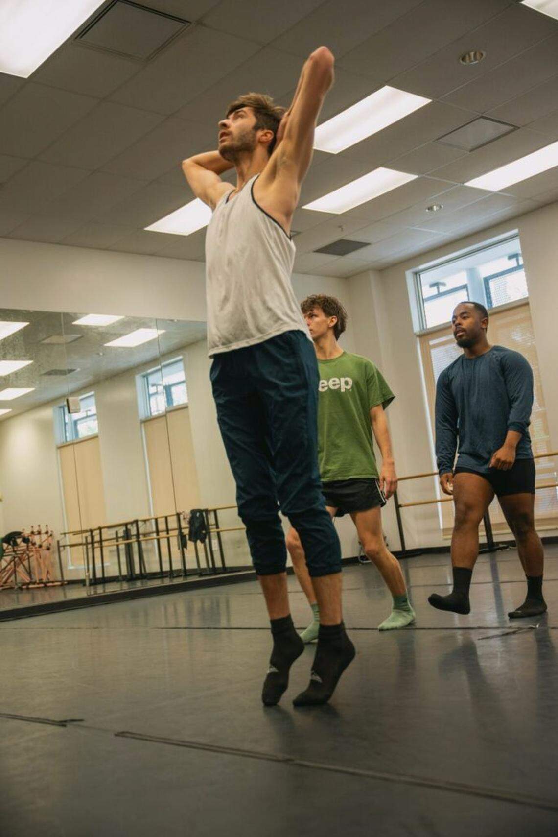 From left, Austin Duclos, David Harris, and Alex Campbell, rehearsing “Terra Mia | My Land,” choreographed by Diego Salterini.