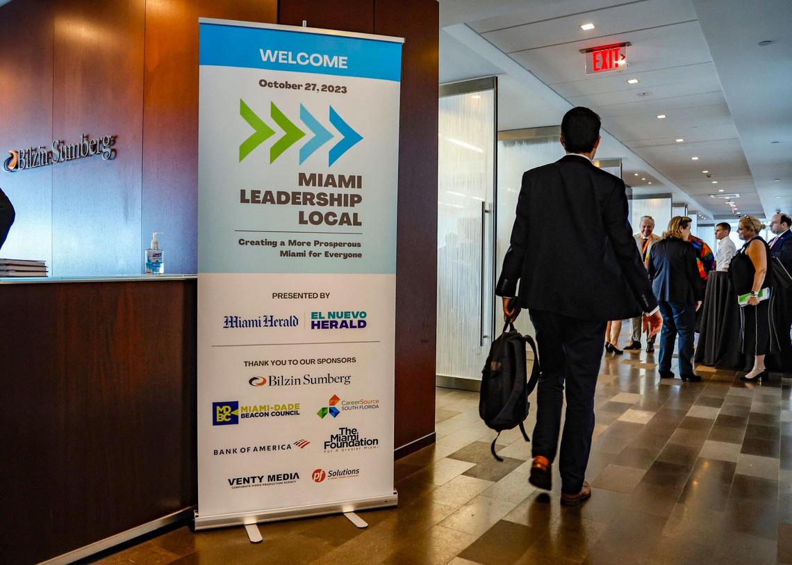 Attendees arrive for the Miami Leadership Local conference at Bilzen Sumberg in Miami on Friday, October 27, 2023.