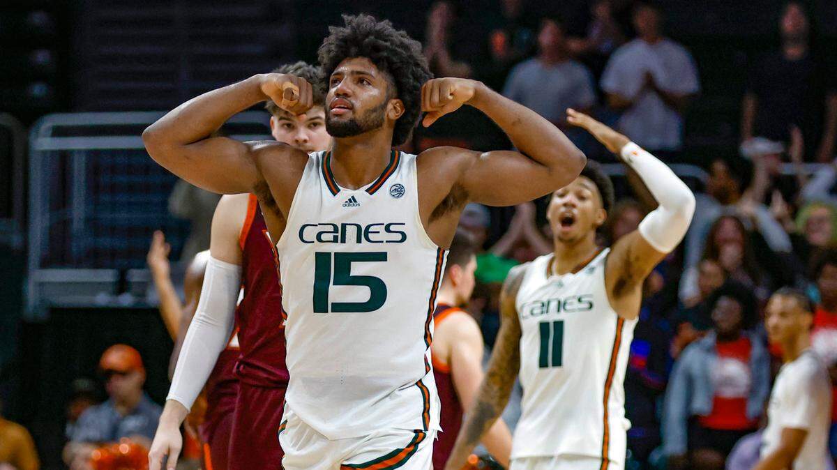 Miami Hurricanes forward Norchad Omier (15) and guard Jordan Miller (11) celebrate as the Hurricanes hold the lead late in the second half against Virginia Tech Hokies at Watsco Center in Coral Gables, Florida on Tuesday, January 31, 2023.