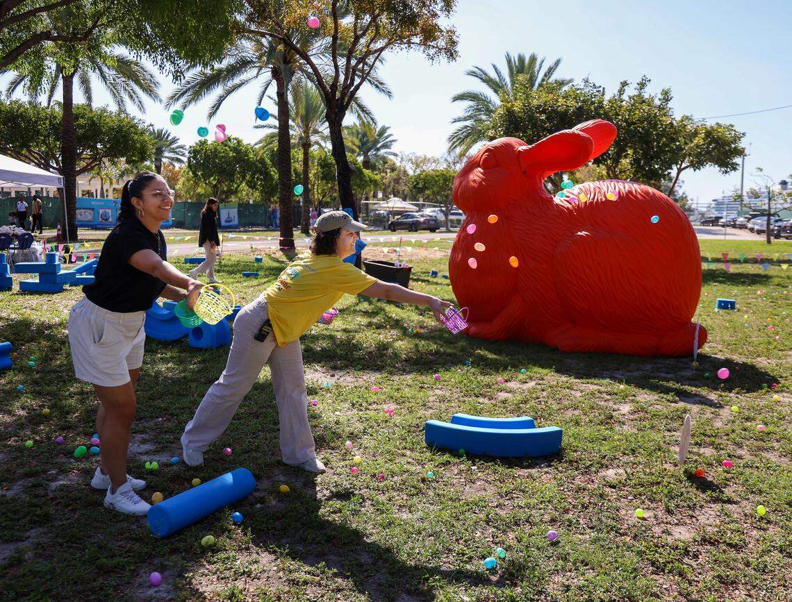 Alejandra Carro and Liam Bouza toss eggs for children to gather in this file photo from April 9, 2023, at Miami Children’s Museum’s “Spring Fling Easter Celebration.”