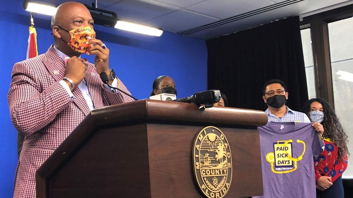 Oliver Gilbert, vice-chairperson of the Miami-Dade County Commission, addresses reporters after passage of his legislation requiring paid sick leave for private security guards assigned to county facilities. The ordinance passed the commission on Sept. 1, 2021.