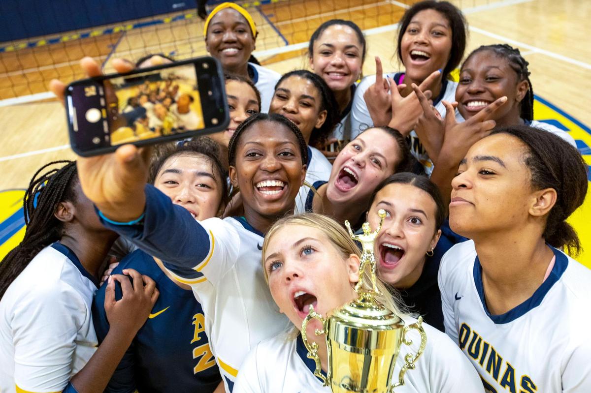 St. Thomas Aquinas girls volleyball team celebrates after winning the BCAA Big 8 Championship over South Plantation at Pompano Beach High in Pompano Beach, Florida, on Thursday, October 13, 2022.