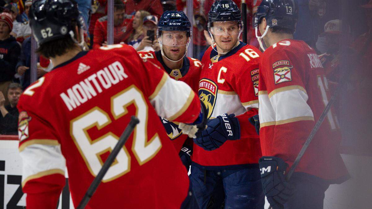 Florida Panthers center Aleksander Barkov (16) celebrates his goal with teammates Sam Reinhart (13), Carter Verhaeghe (23), and Brandon Montour (62) during the first period of a hockey game on Thursday, Feb. 29, 2024, at Amerant Bank Arena in Sunrise, Fla.