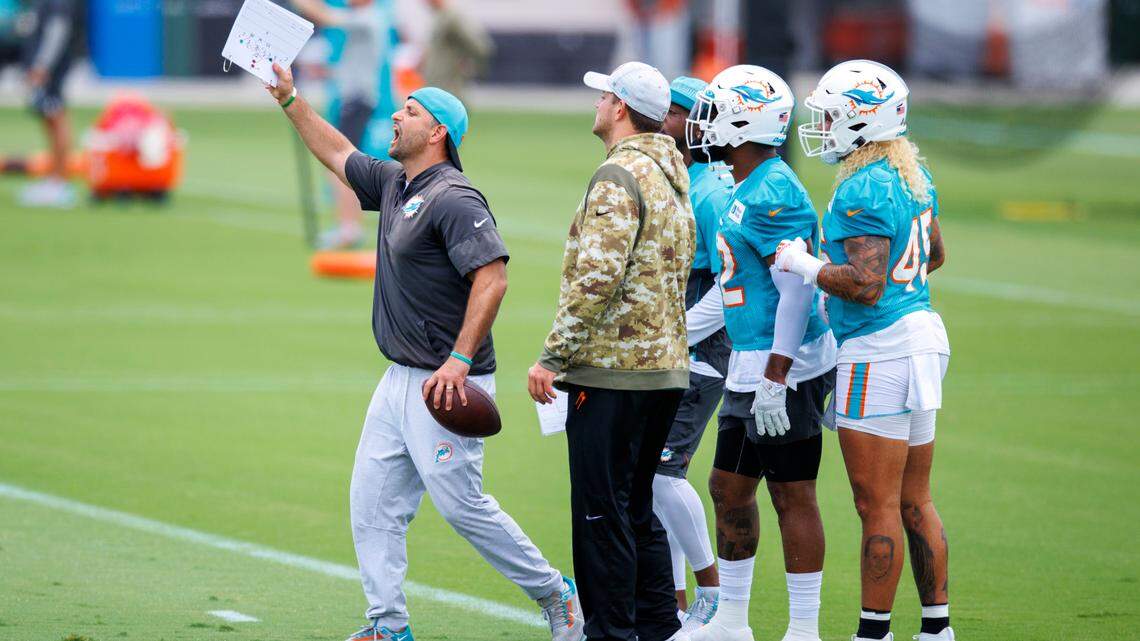 Miami Dolphins linebackers coach Anthony Campanile talks to his players during the NFL football team’s organized team activities at Baptist Health Training Complex in Hard Rock Stadium on Tuesday, May 24, 2021 in Miami Gardens, Florida, in preparation for their 2022-23 NFL season.