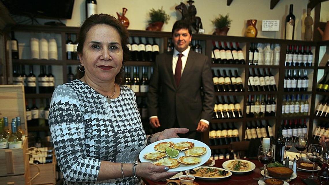 Pamela Canales, owner of Pamela’s, and Chile’s commercial attaché Sacha D. Garafulic.