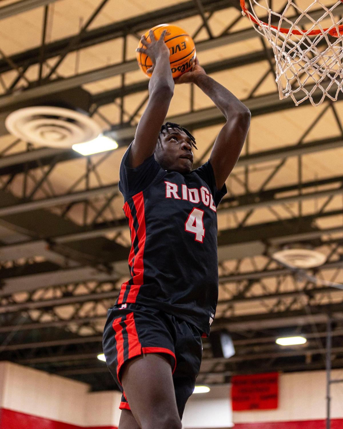 Spartans guard Koree Cotton dunks the ball inside the gym at Miami Southridge High in Miami, Florida, on Friday, January 6, 2023.