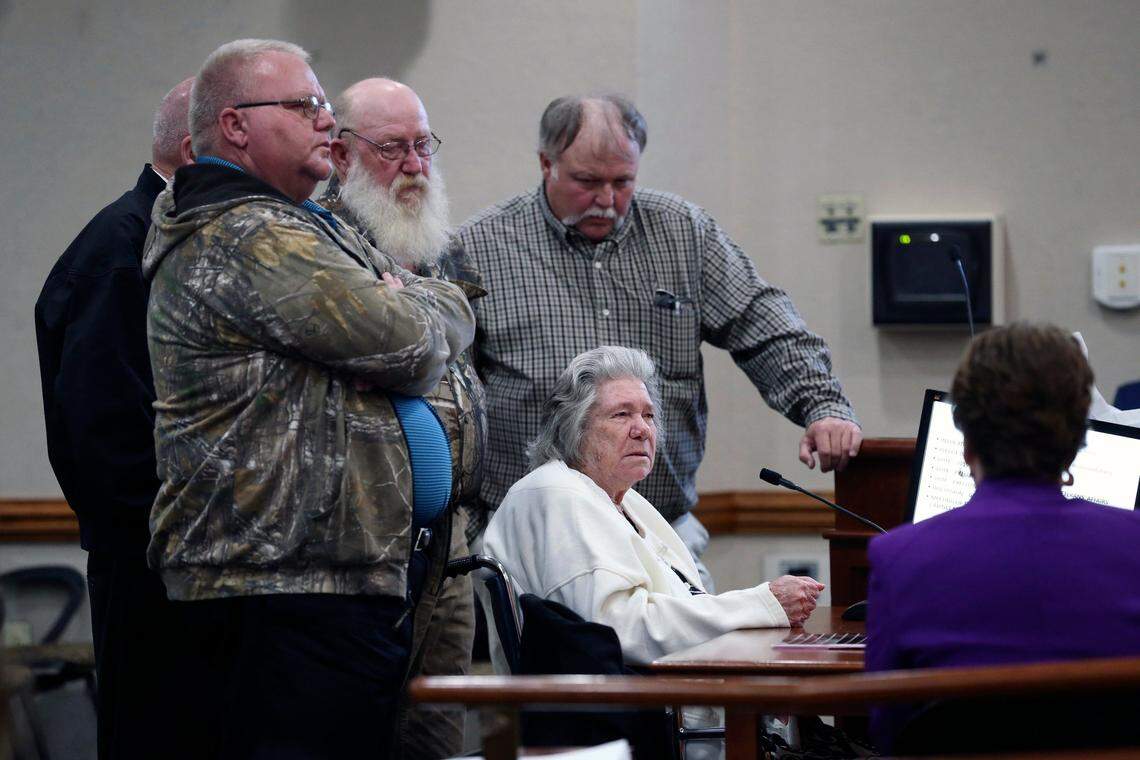 Surrounded by her sons, Norma Padgett, the accuser of the Groveland Four, hits her fist on the table and pleads with the clemency board not to pardon the Groveland Four during a clemency board hearing at the Florida State Capitol on Jan. 11.