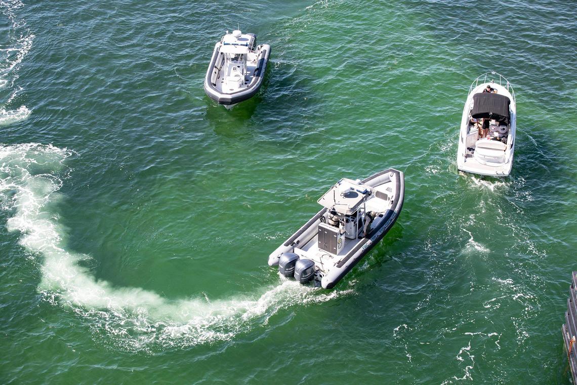 FWC law enforcement officers inspect boats on Biscayne Bay to make sue they comply with Miami-Dade County ordinances during COVID-19 as the county opens parks and marinas on Saturday, May 2, 2020.