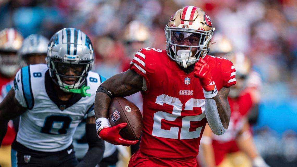 Carolina Panthers cornerback Jaycee Horn (8) chases San Francisco 49ers running back Jeff Wilson Jr. (22) during an NFL football game on Sunday, Oct. 9, 2022, in Charlotte, N.C. (AP Photo/Jacob Kupferman)