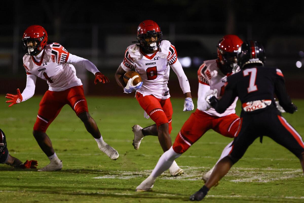 Monarch Knights wide receiver Samari Reed (0) runs with the football against the Southridge Spartans during the first quarter of a high school football playoff game at Southridge Park in Miami, Florida, on Friday, November 22, 2024.