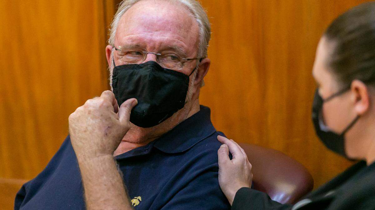 Tom Privett speaks to his attorney Nina Tarafa, with Corona Law Firm, during his sentencing hearing at Richard E. Gerstein Justice Building in Miami, Florida on Wednesday, November 17, 2021. Privett, a retired South Dade government teacher, pleaded guilty to raping an underaged student.
