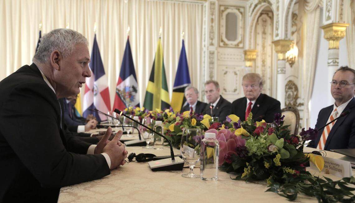 In 2019, the prime minister of St. Lucia, Allen Chastanet, left, greets members of the media before the start of an official meeting. President Donald Trump met with leaders from the Bahamas, the Dominican Republic, Haiti, Jamaica and St. Lucia at Mar-A-Lago in Palm Beach.