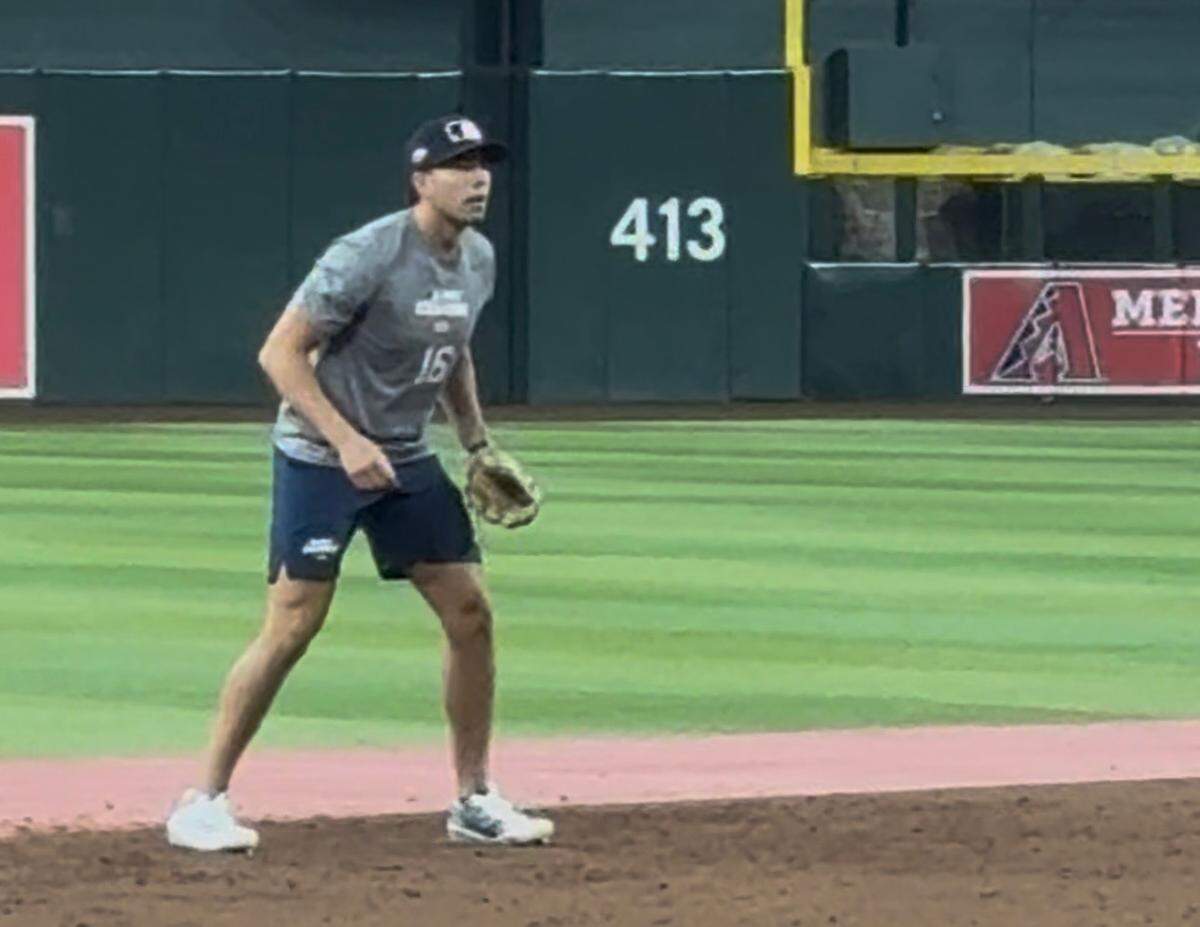 Archbishop McCarthy alumnus Antonio Jimenez participates in fielding drills recently at the Major League Baseball Draft Combine at Chase Field in Phoenix, Arizona.