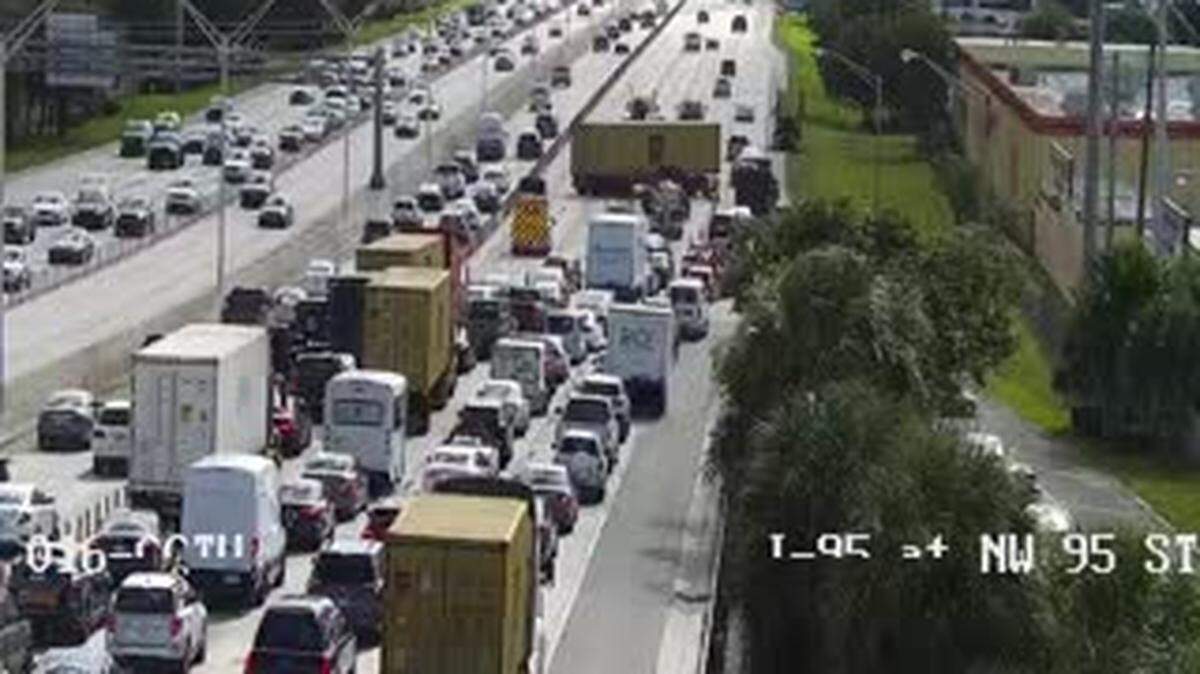 Interstate 95 south in North Miami-Dade, 1:25 p.m. with the truck overturned just past the Northwest 95th Street entrance.