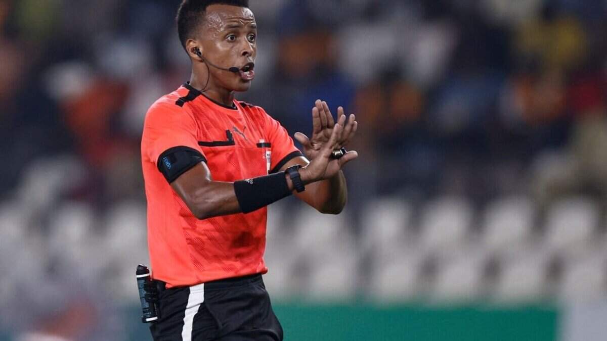 Somalian referee Omar Abdulkadir Artan gestures during the Africa Cup of Nations (CAN) 2024 group D football match between Mauritania and Algeria at Stade de la Paix in Bouake on January 23, 2024. (Photo by KENZO TRIBOUILLARD / AFP) (Photo by KENZO TRIBOUILLARD/AFP via Getty Images)
